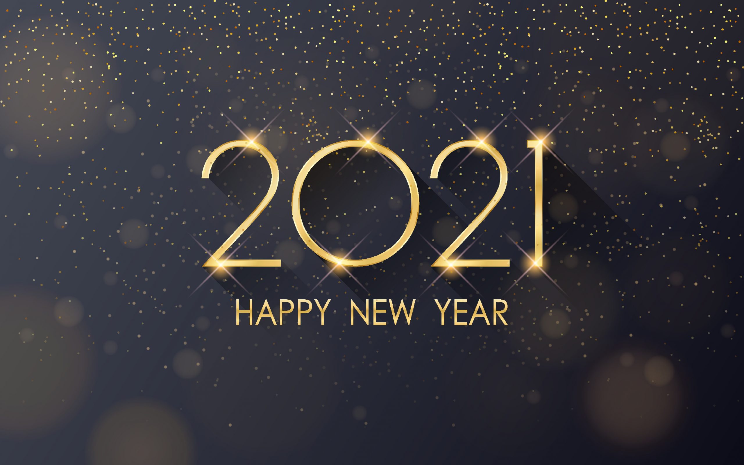 A golden glitter and black background with the year 2021 in gold and the golden letters beneath it saying "Happy New Year." Image licensed from Adobe Stock..