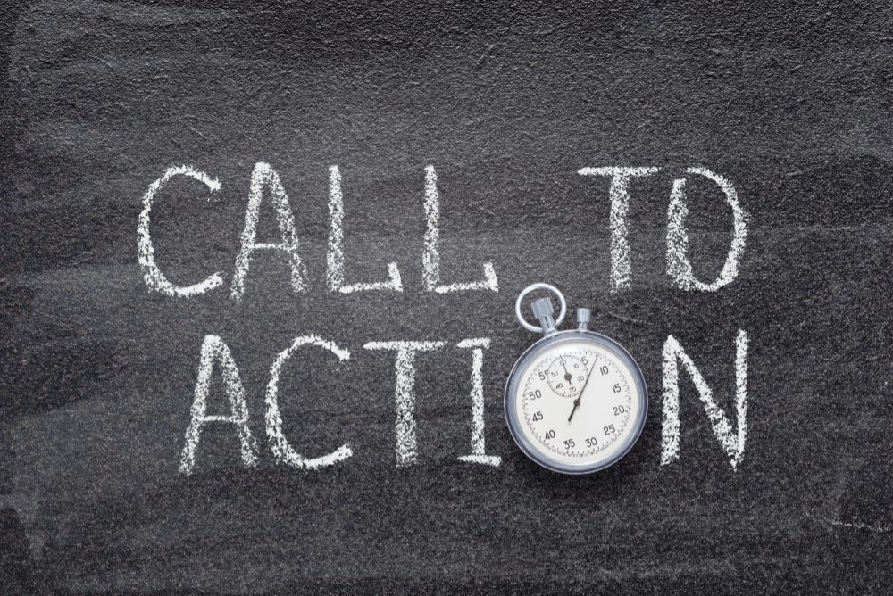 A blackboard with the words "Call to action" written on it in chalk, with the "o" replaced by a stopwatch. Image licensed through Adobe Stock.